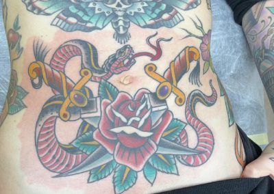 schlänge snake rose dagger Dolch tattoo zürich traditional